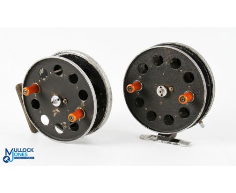 A pair of W R Products Speedia alloy trotting reels, 4" caged spool, twin brown handles, rim mounted on/off check. Both show 