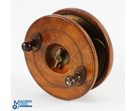 Mahogany and brass circle back Nottingham reel, 6" diameter, shaped cow horn handles, brass wing nut, brass lined drum, optio