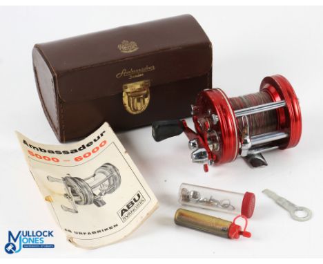 Abu Sweden Ambassadeur multiplier reel 6000, foot No 060600, side tensioner, runs very smooth. With instructions, parts, oil 
