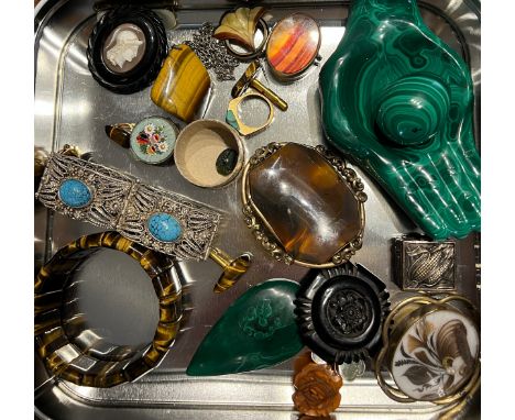 A quantity of 19thC and 20thC costume jewelllery etc to include jet brooches, tigers eye bangle, cufflinks and pendant, malac