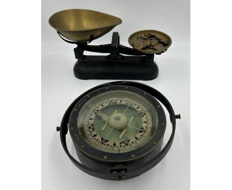 A gimbal mounted brass ship's compass PATT. 0995 No. 161K (23 cm d), together with a set of 2lb Avery scales with various bra