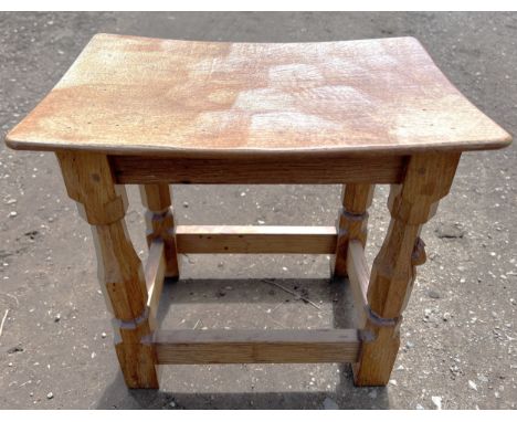 An oak Robert 'Mouseman' Thompson stool with adzed top. 40cm w x 27.5cm d x 31cm h. 