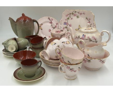 A pink Tuscan bone china tea service with blossom and butterfly pattern (teapot, milk, sugar, 6 x cups and saucers, sandwich 