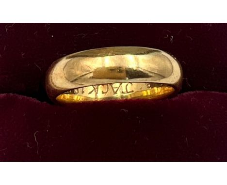 A 18 carat Welsh gold wedding band. Size K. Weight 4.7gm. With certificates. 