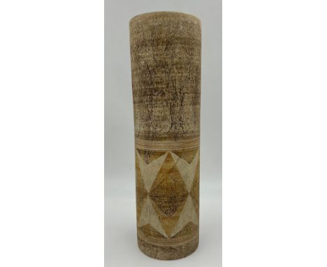 Large cylindrical Troika vase decorated in brown hues and geometric shapes to lower half,  37cm h x 11cm d. Mark to base poss