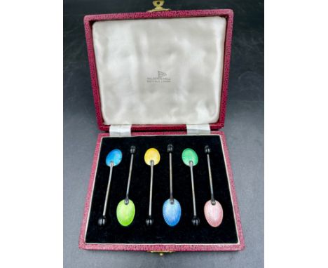 A boxed set of six  harlequin guilloche enamel and silver coffee spoons, with bean terminal, Birmingham 1959 Walker &amp; Hal