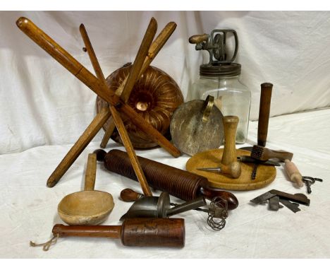 An assortment of kitchenalia to include a large copper mould 29cm d, a portable wooden stand, a Blow butter churn, a ribbed r