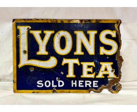 An original 'Lyons' Tea Sold Here' double sided enamel advertising sign measuring 30.5 x 45.5cm. 