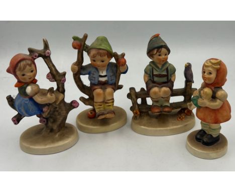 Four various Hummel/Goebel figurines. 