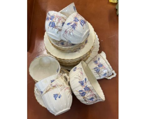 A late 19thC hairbell patterned part teaservice comprising 8 cups, 11 saucers, 11 plates, slop bowl, milk jug, and sandwich p