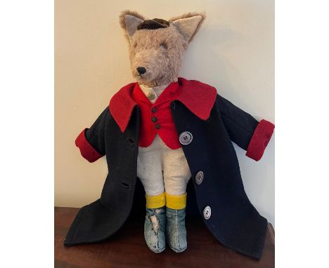 A vintage toy fox in hunting attire. 43cm h. 