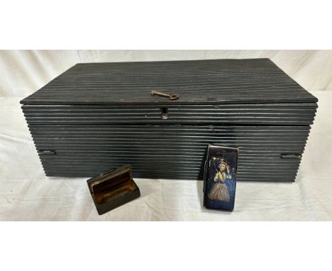 A 19thC ebonised combination writing slope box with a reeded ebony case, fitted interior, three secret drawers and a key toge