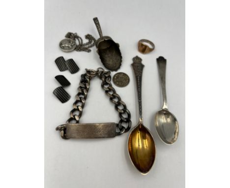 A quantity of hallmarked and .925 silver to include caddy spoon, identity bracelet, spoons, cufflinks etc. 117gm. 