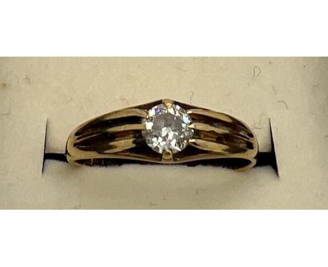 An 18 carat gold diamond solitaire ring. Size R. Weight 3.4gm. 