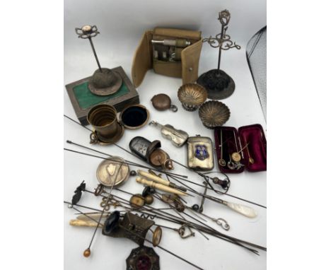 A miscellaneous lot to include a quantity of hat and stick pins, including Charles Horner silver, French .800 silver lidded p