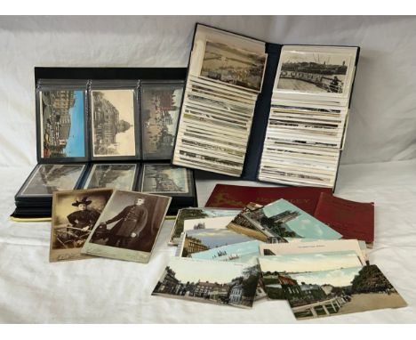 A Collection of postcards and books. Approx 100+ of Hull in an album, 50+ Beverley cards loose, 100+ Harbours around the UK i