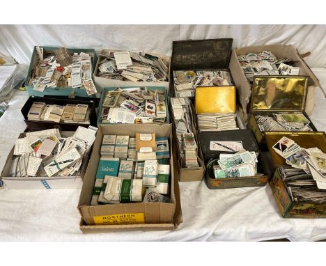 A large quantity of cards, majority loose cigarette cards, some in vintage tins, Senior Service, John Player, WD &amp; HO Wil