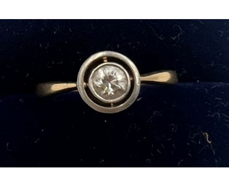 An 18 carat gold solitaire diamond ring. Size K. Weight 2.2gm. 