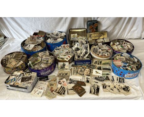 A quantity of various cigarette cards in tins to include Sarony, J. Wix &amp; Sons Ltd, Cavanders Ltd, Ogdens, John Player &a