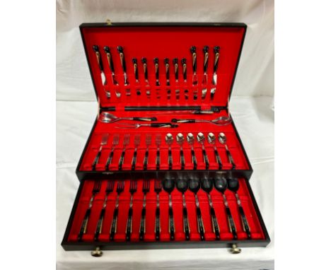 A vintage cased 12 piece Jezzine Phoenix cutlery set comprising of a 6 place setting 6 forks, 6 spoons, 6 knives along with a