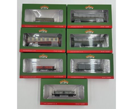 Seven Bachmann Narrow Gauge OO9 gauge wagons and coaches to include 393-051 d class open bogie wagon 'nocton estates', 393-02