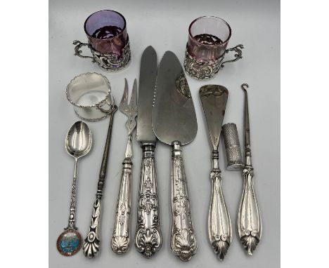 Various silver items to include Lipstick holder, napkin ring, Cup holders by William Comyns, boxed silver handled knives, sil