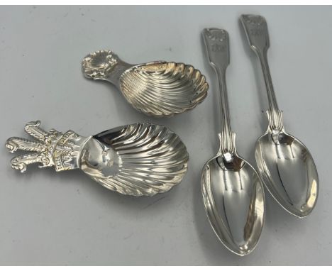 Silver to include two caddy spoons, Birmingham 1977 and Sheffield 1981 together with two teaspoons London 1899 Total weight 1