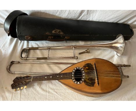 An early 20thC mandolin together with a vintage cased Besson &amp; Co. trombone. 