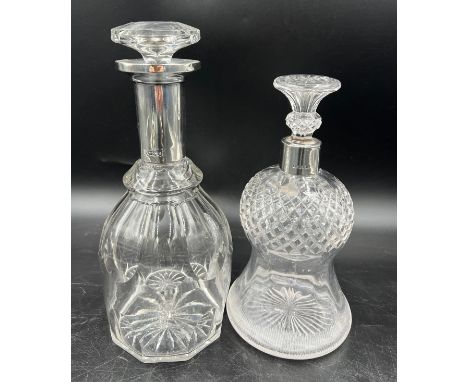 Two silver necked glass decanters to include Sheffield 1901, maker Walker and Hall and Sheffield 1921, maker William Hutton &