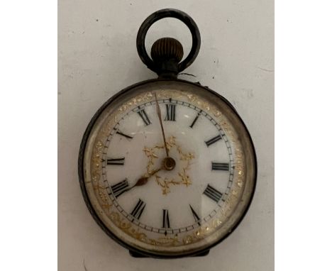 A ladies continental pocket watch with white enamel dial. Inscribed to interior 13th Feb 1911. 3cm d. Total weight 26.3gm. 