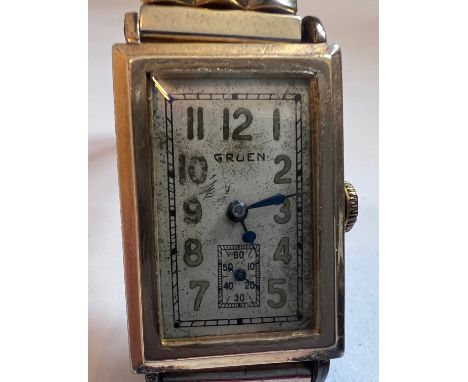 A late 1930's manual Gruen 10K rolled gold wristwatch with subsidiary seconds dial. 15 jewel.Winds and goes. 