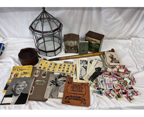 A miscellaneous lot to include cigarette and tea cards, John Players, Gallaher, Park Drive, Wills etc, Bentima clock with key