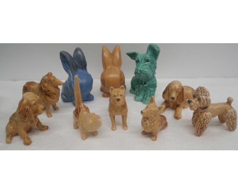 Collection of ten ceramic animal figures including Wade and Sylvac. Comprising of seven dogs, two rabbits and a cat.