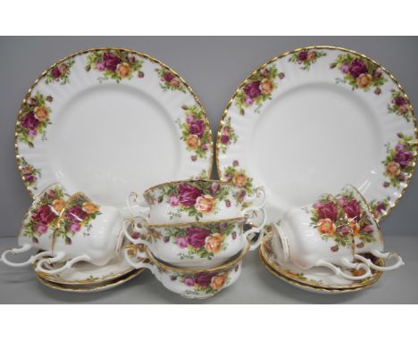 A bone china Royal Albert dinner service for six in the Old Country Roses pattern, including soup bowls, fruit bowls, dinner 