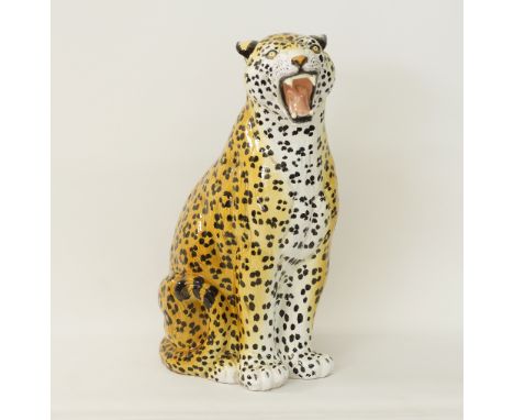 An Italian majolica / ceramic sculpture of a leopard, hand painted and marked underneath, H58cm, W27cm, D42cm, loss to one ca