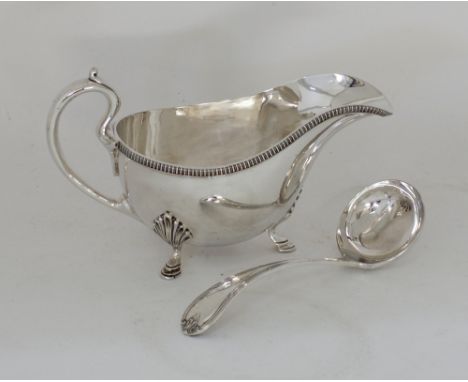 A Mappin &amp; Webb - London &amp; Sheffield, silver plated sauce boat W19cm and sauce ladle, early 20th century. (2) Provena