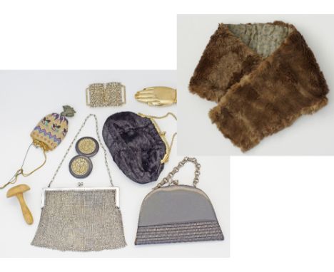 A collection of ladies vintage accessories comprising of a 1920s French microbead coin pouch, three handbags, two belt buckle