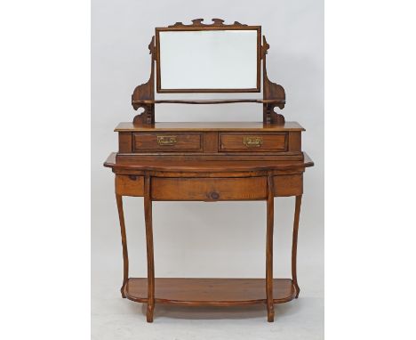 A Cypriot breakfront dressing table with a mirror above two drawers, on a pine console, W100cm, H144cm, D50cm, early to mid 2