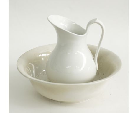 A German Villeroy &amp; Boch - Dresden white ceramic wash basin and pitcher, the basin diam. 35,5cm, with some brown stains. 