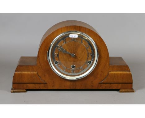 A British made walnut cased Westminster chime mantel clock complete with pendulum and key.