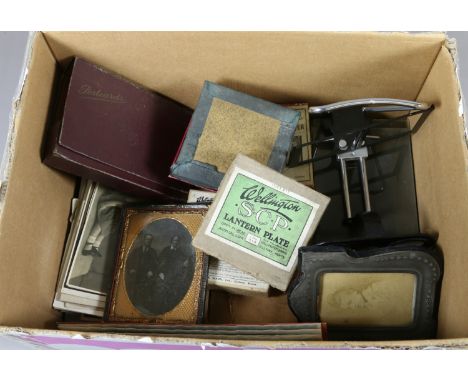 A collection of photographic items to include large and small lantern plates in original boxes, Agfacolor negatives and a sli