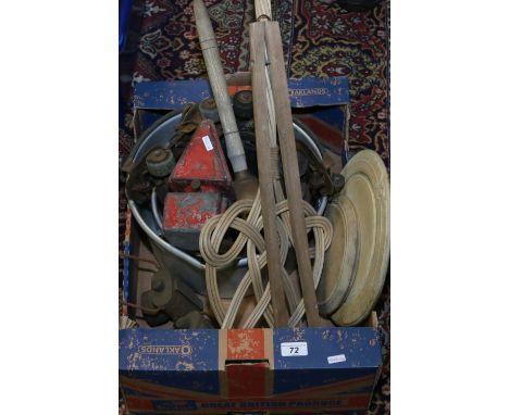 A collection of metalwares alluminium pots, World War II cycle lights, vintage roller skates, oil heater, carpet beater and b