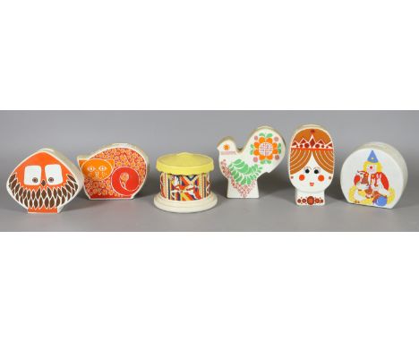 A collection of retro novelty ceramic money boxes.
