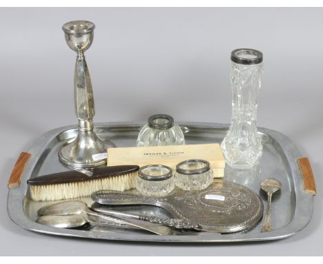 A good collection of silver to include hand mirror, candlestick, cutlery, silver rimmed vase, ink well and salts etc.