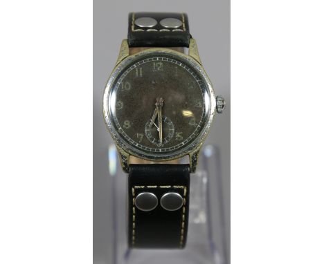 A Helios German military World War II manual wristwatch with black dial and second subsidiary dial.