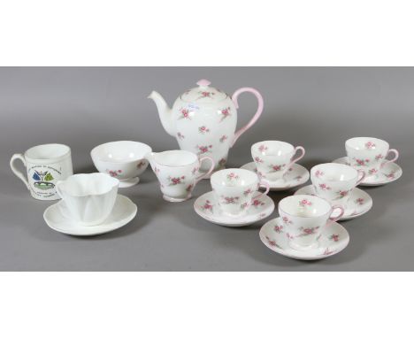A Shelley five place tea service decorated with roses, an undecorated cup and saucer and a 1911 George & Mary coronation mug.