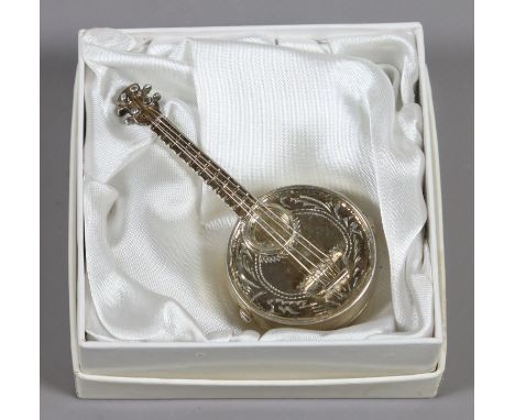 A boxed silver snuff box modelled in the form of a banjo stamped 925 assayed Sheffield.