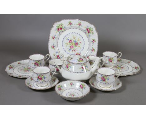 A Royal Albert bone china part tea service decorated with flowers, thirteen pieces. Condition Report. To be used as a guide o