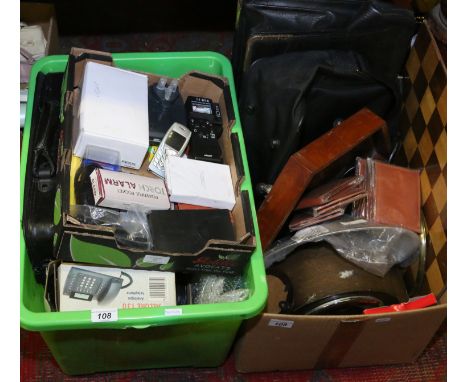 Two boxes of miscellaneous to include laptop computers and mobile phones along with leather wallets and a mantel clock.