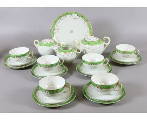 A Nippon china tea service with pink and green enamel and gilt decoration including teapot, cups and saucers, plates, sugar b